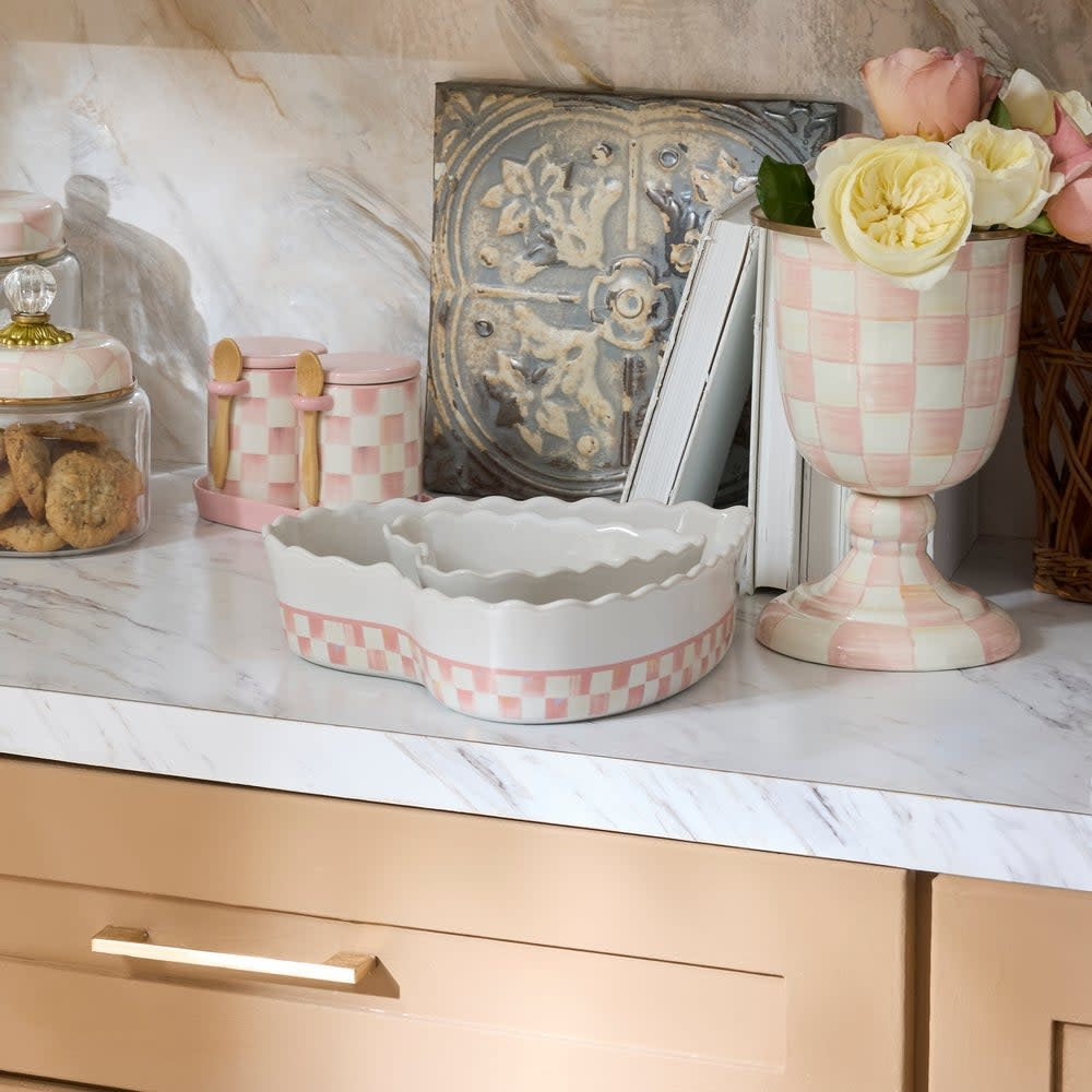 Rosy check stoneware heart-shaped baking dish with oven-safe handle