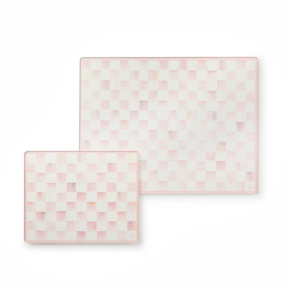 Two tempered glass cutting boards with a rosy check floral pattern in small and large sizes.