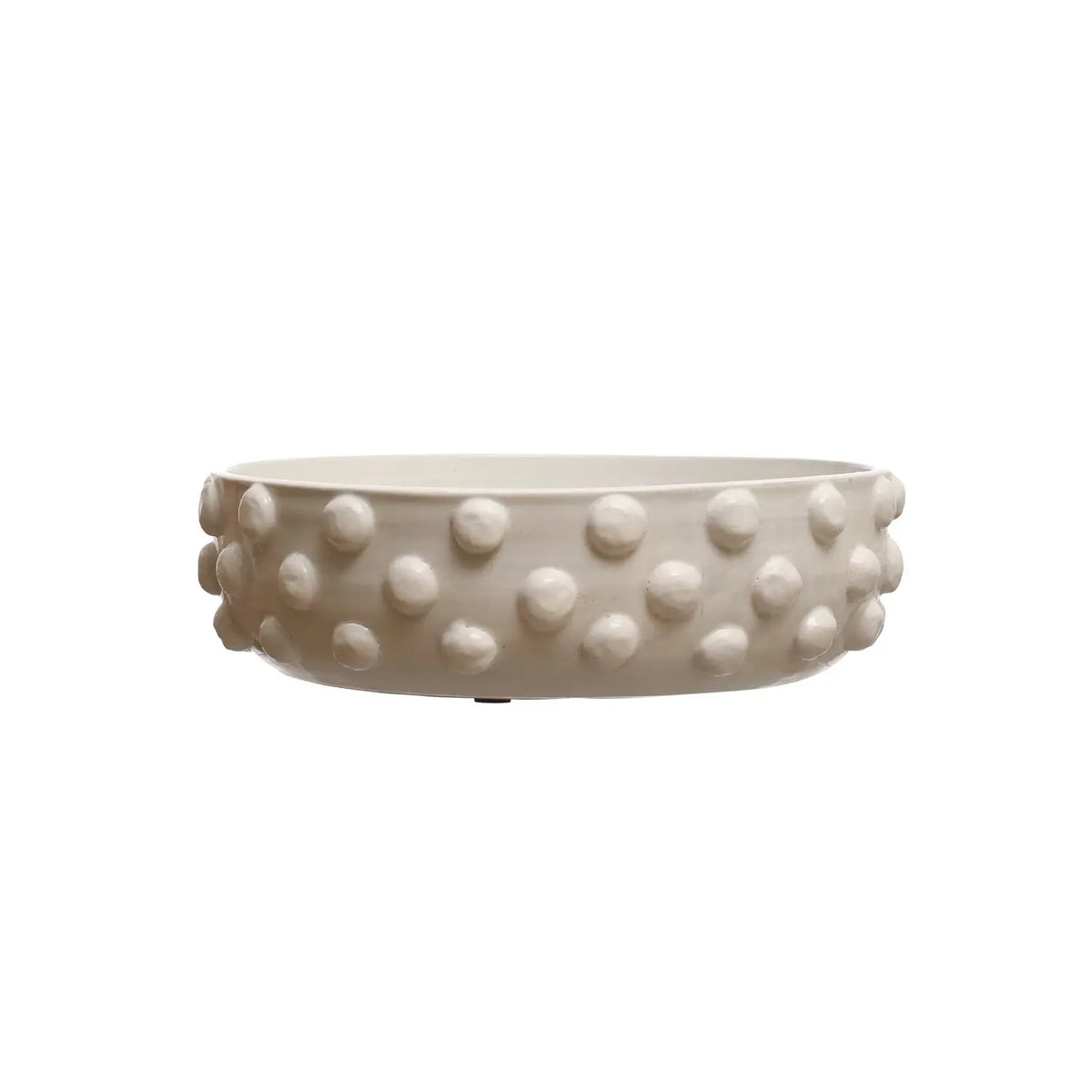 Round terracotta bowl with crackle glaze finish featuring raised dot texture pattern
