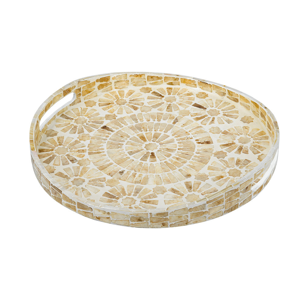 Round wooden accent tray with gold capiz top featuring abstract floral patterns and geometric shapes.