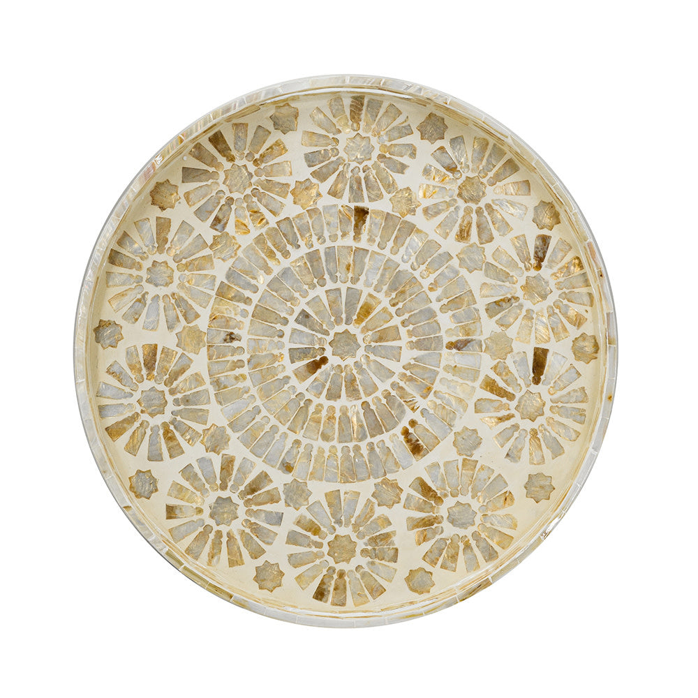 Round wooden accent tray with gold capiz inlay featuring abstract floral patterns and geometric shapes.