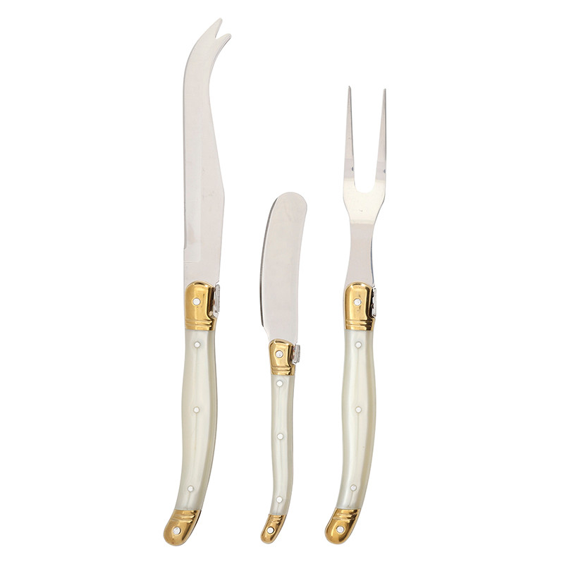 Three-piece cheese knife set with pearl white handles and gold accents on a white background.