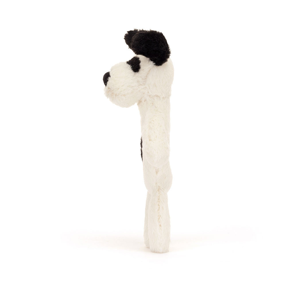 Bashful black and cream puppy ring rattle made from recycled polyester with embroidered eyes.