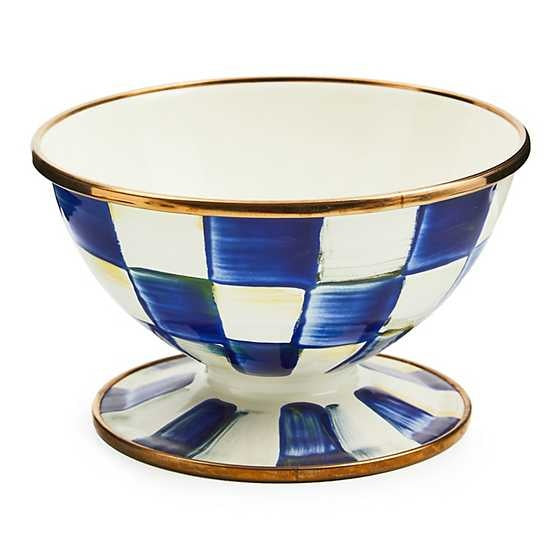 Hand-painted blue check ice cream dish with bronzed stainless steel rim on a pedestal base.