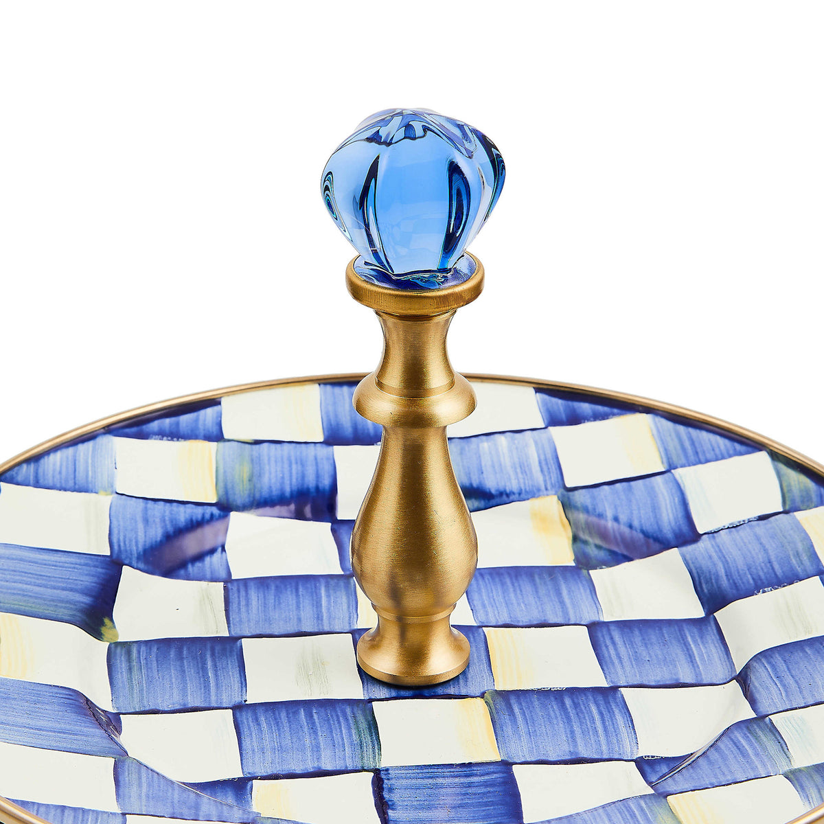 Two-tier steel sweet stand with hand-painted royal check pattern on a bronzed stainless rim.