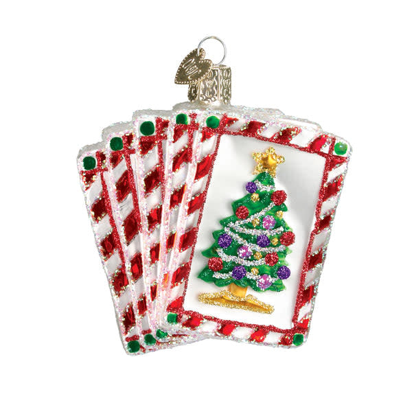 Royal Flush ornament shaped like a playing card with red suit symbols on white background