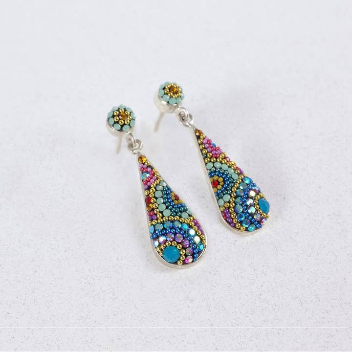 Sterling silver long drop stud earrings featuring Austrian crystals in a royal blue hue with intricate hand-set patterns.