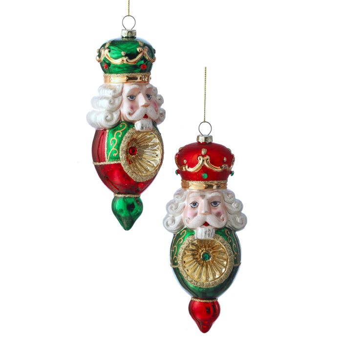 Two 7-inch glass soldier reflector ornaments in red and green with gold accents and white hair.