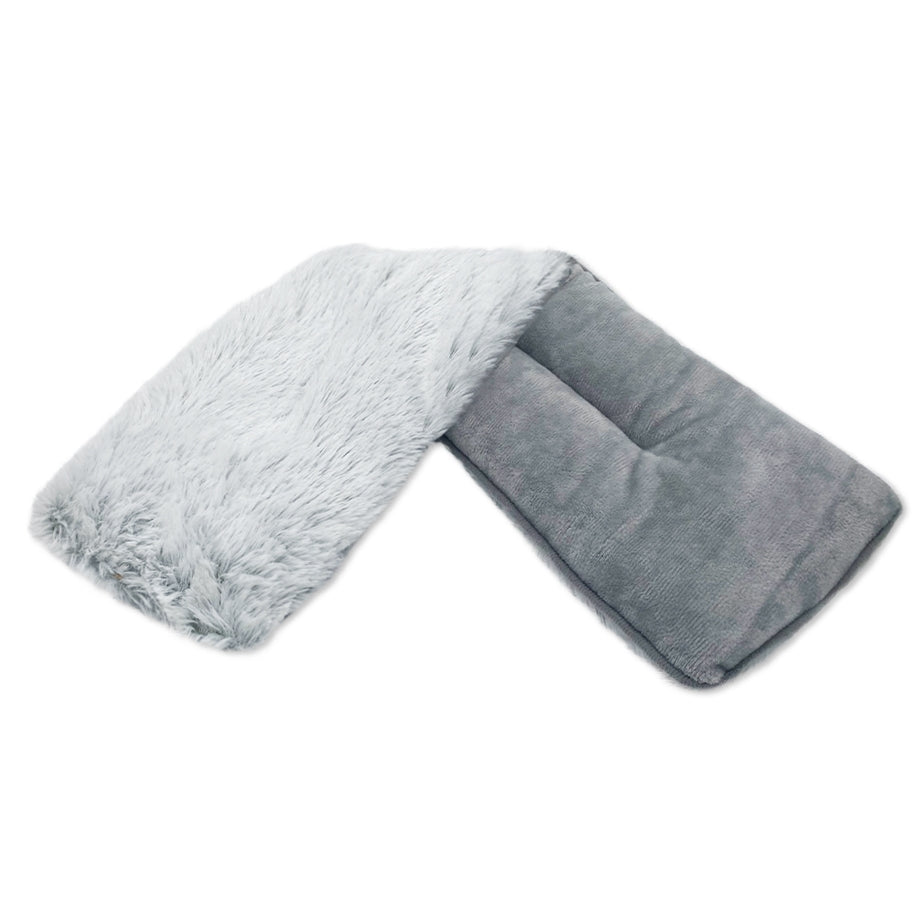 Warmies Neck Wrap in soft lavender fabric with a rectangular shape designed to soothe neck pain.