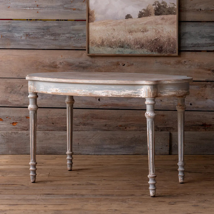 Beau Maison wooden table with a rectangular top measuring 51 by 31 inches and standing 30 inches tall.