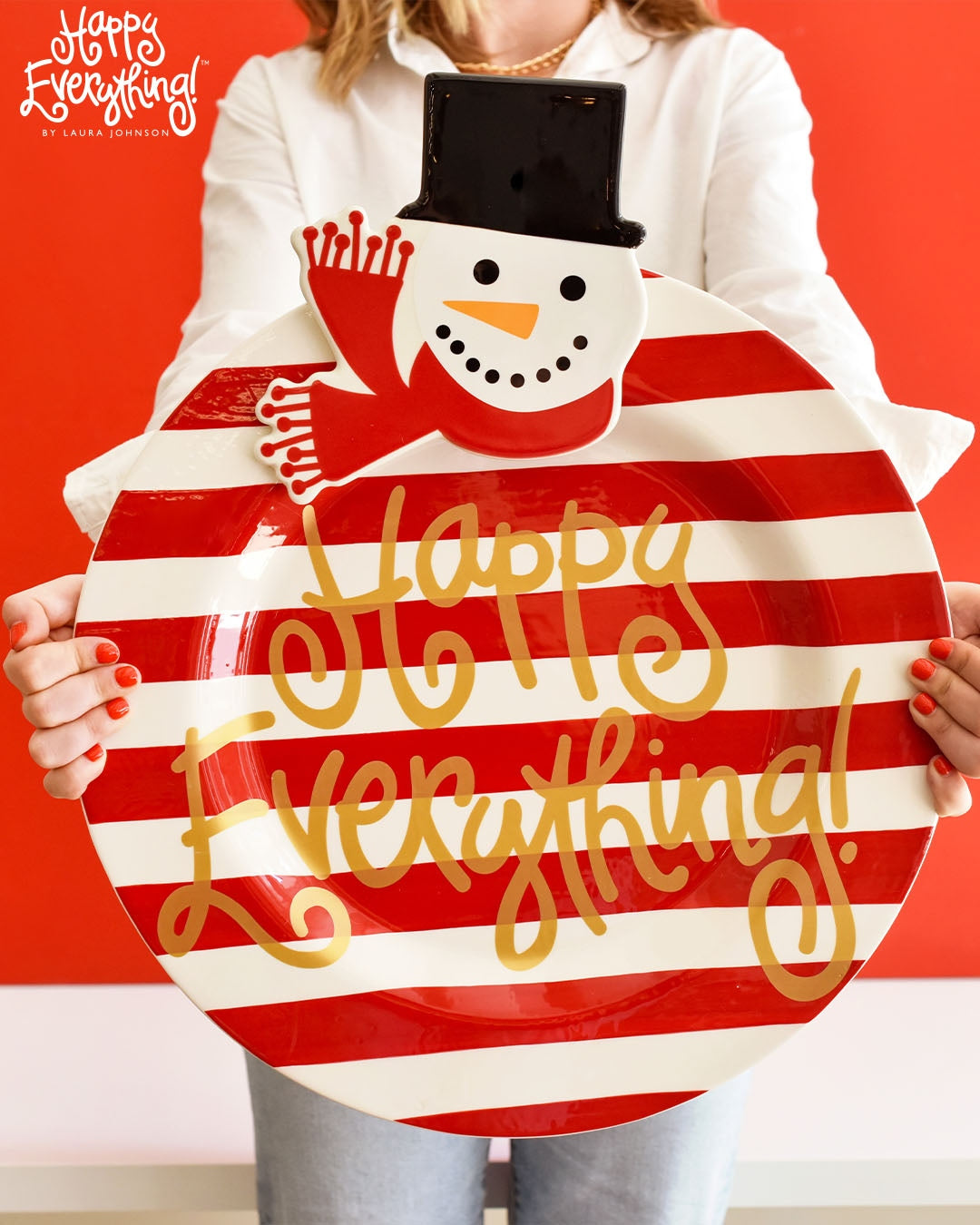 Ceramic round platter in red with white text reading Big Happy Everything!