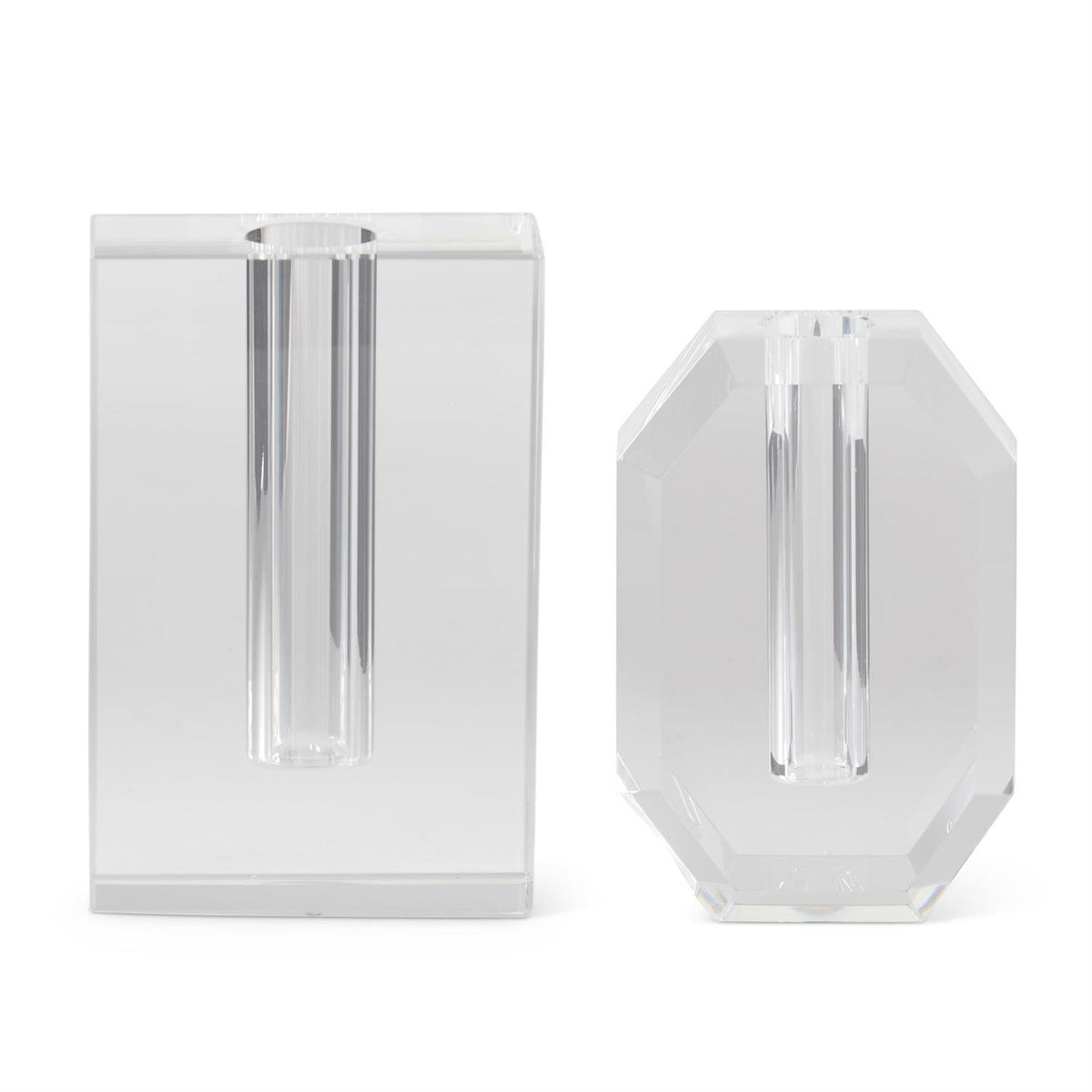Clear crystal geometric bud vase with a faceted triangular shape.
