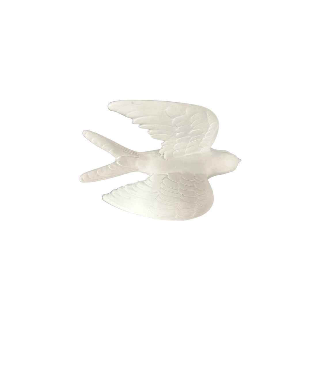 Matte white resin wall hanging featuring a minimalist bird silhouette with smooth edges.