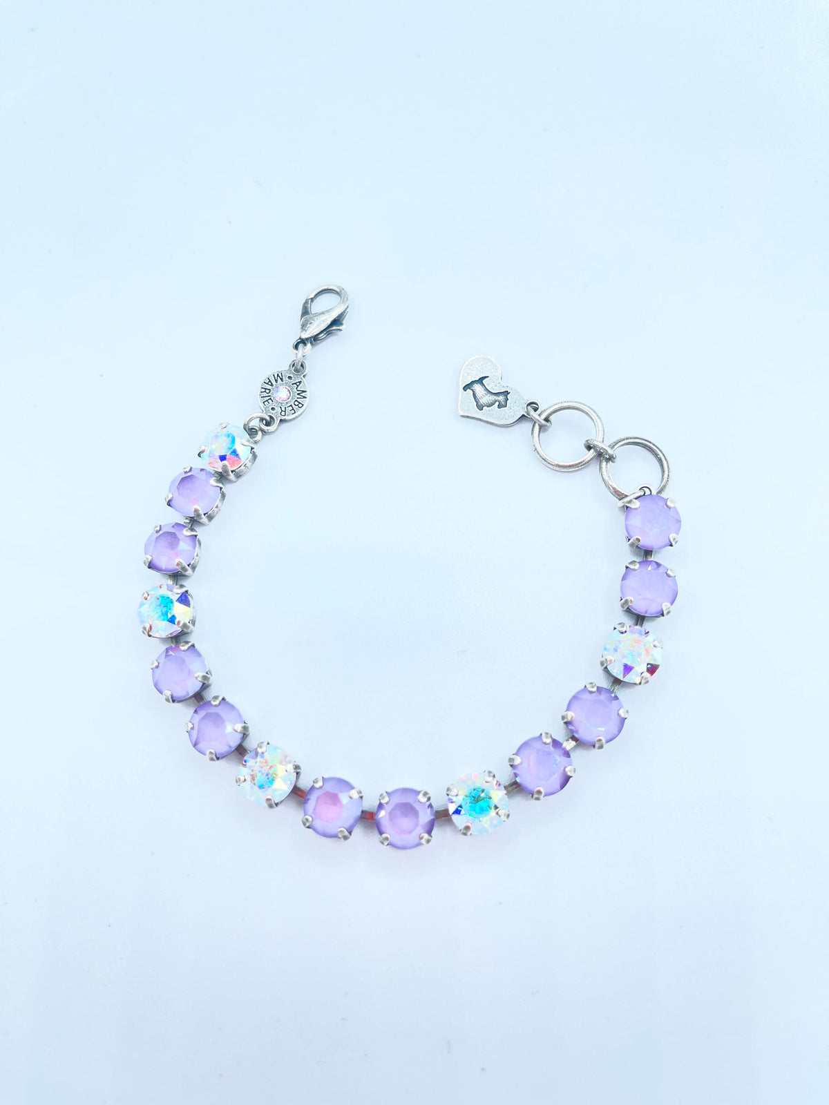 Classic Bracelet Paris featuring lavender, lilac, white, and light green stones with an amber tag heart charm.