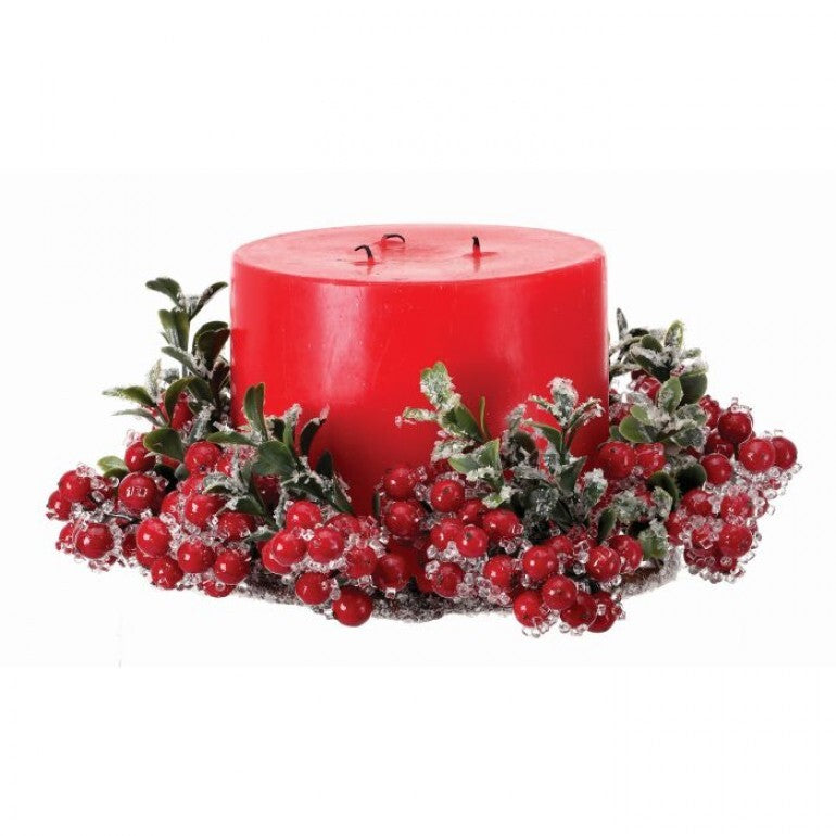 10-inch iced red berry and green boxwood candle ring surrounding a large red pillar candle.