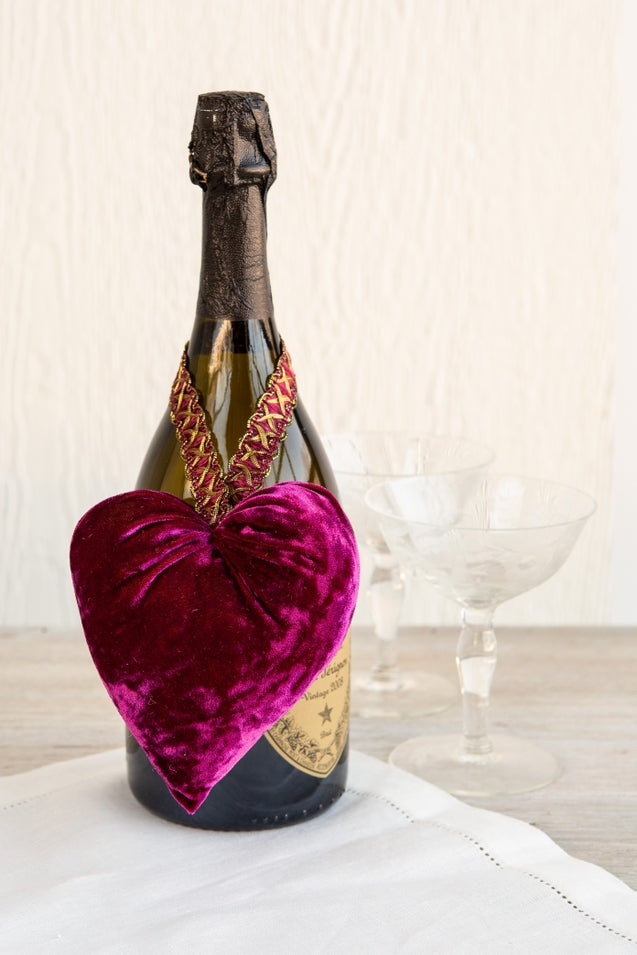 Handmade velvet heart in deep red with a satin ribbon loop.