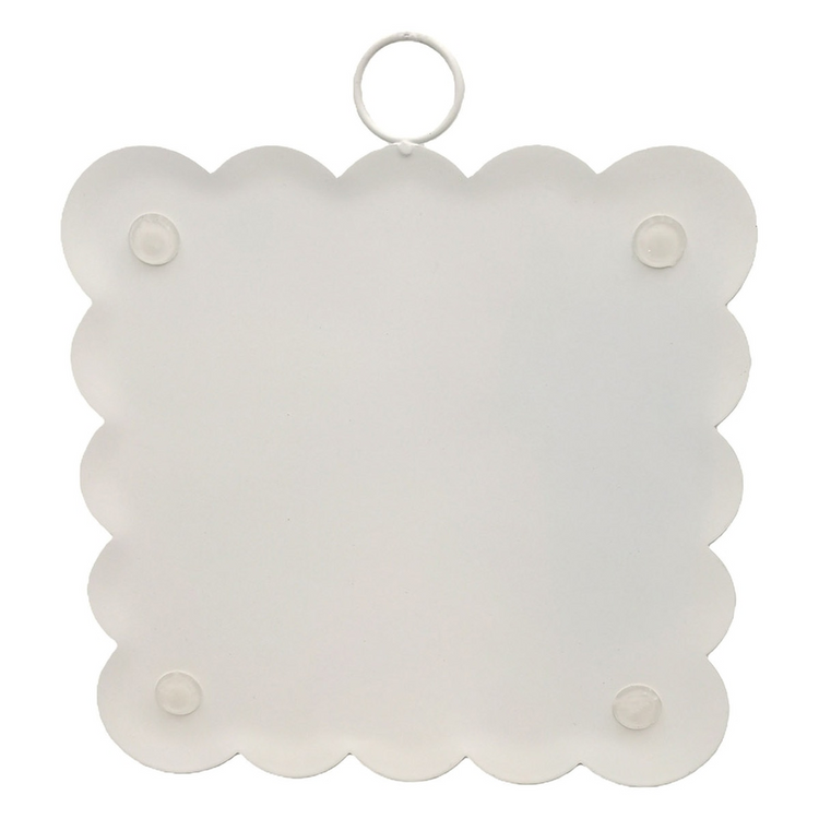 Back view of a white mini scallop art piece with a hanging ring and four protective bumpers.