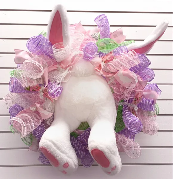 Polyester bunny decor kit with wire frame structure measuring 25 inches tall.