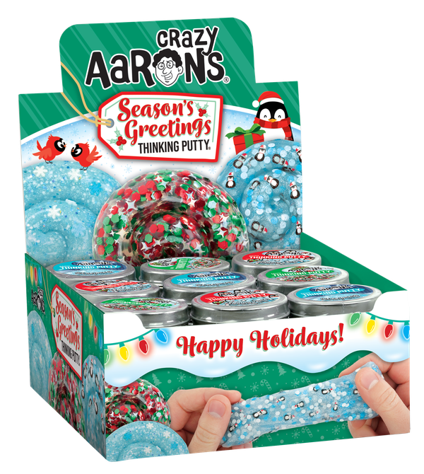 Crazy Aaron's Thinking Putty Holiday Mini Tin display with penguins and glitter.