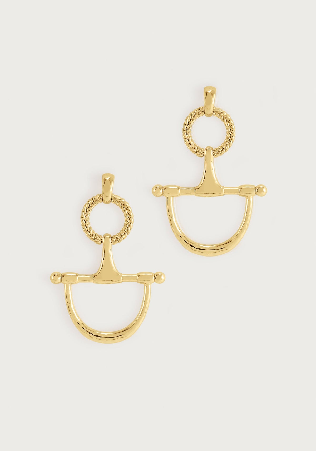 Gold drop earrings featuring a horse bit design with a braided ring and 18k gold dipped finish.