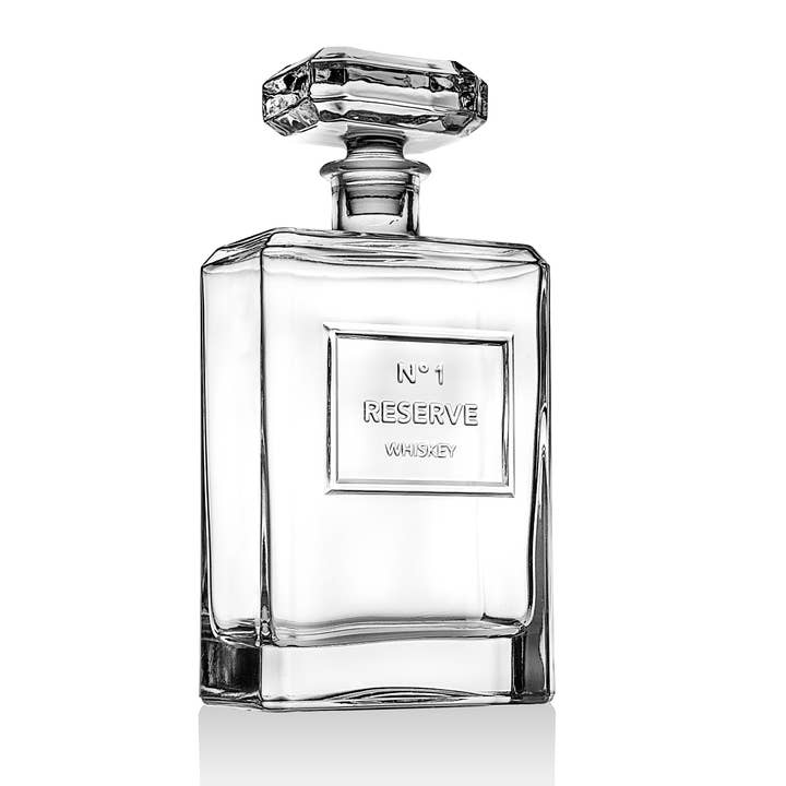 Reserve Whiskey Decanter in clear glass with a wide cylindrical body and narrow neck.