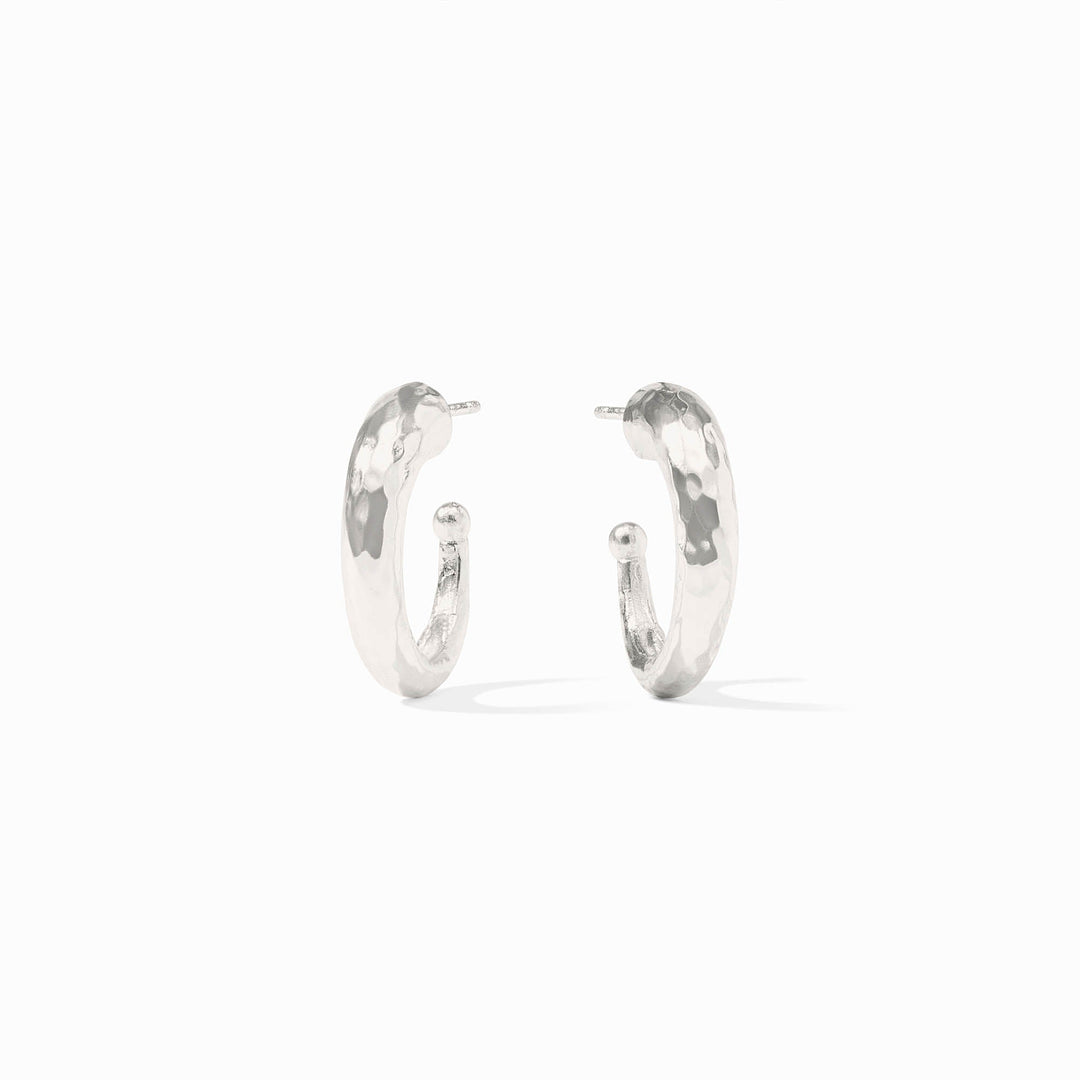Small hammered silver hoop earring with pure silver plated back.