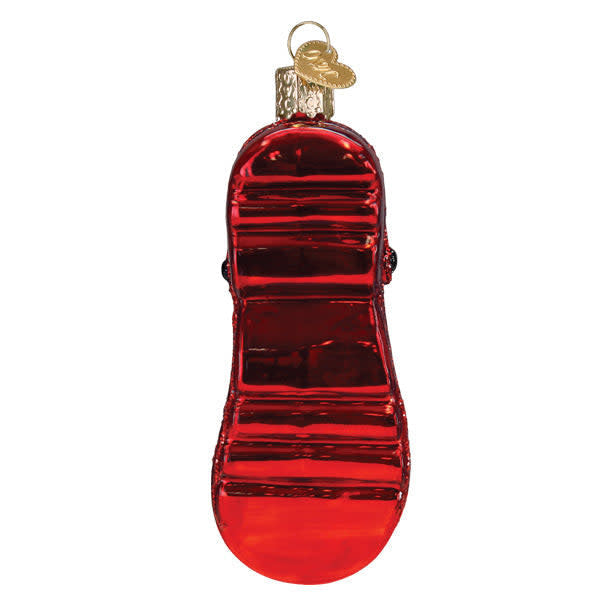 Black rubber clog ornament with classic silhouette and glossy finish.