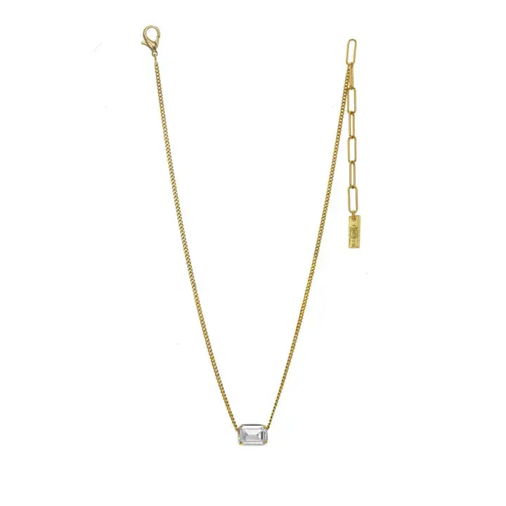 Antique gold plated brass necklace with clear crystal pendant on a 14-inch chain.