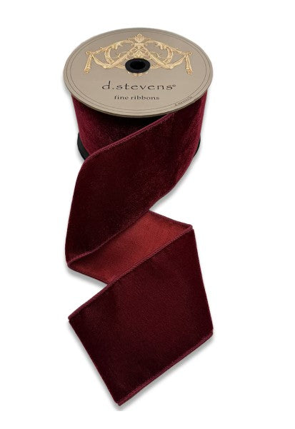 4 inch wide ruby red lush velvet ribbon with dupion back on a d.stevens spool.