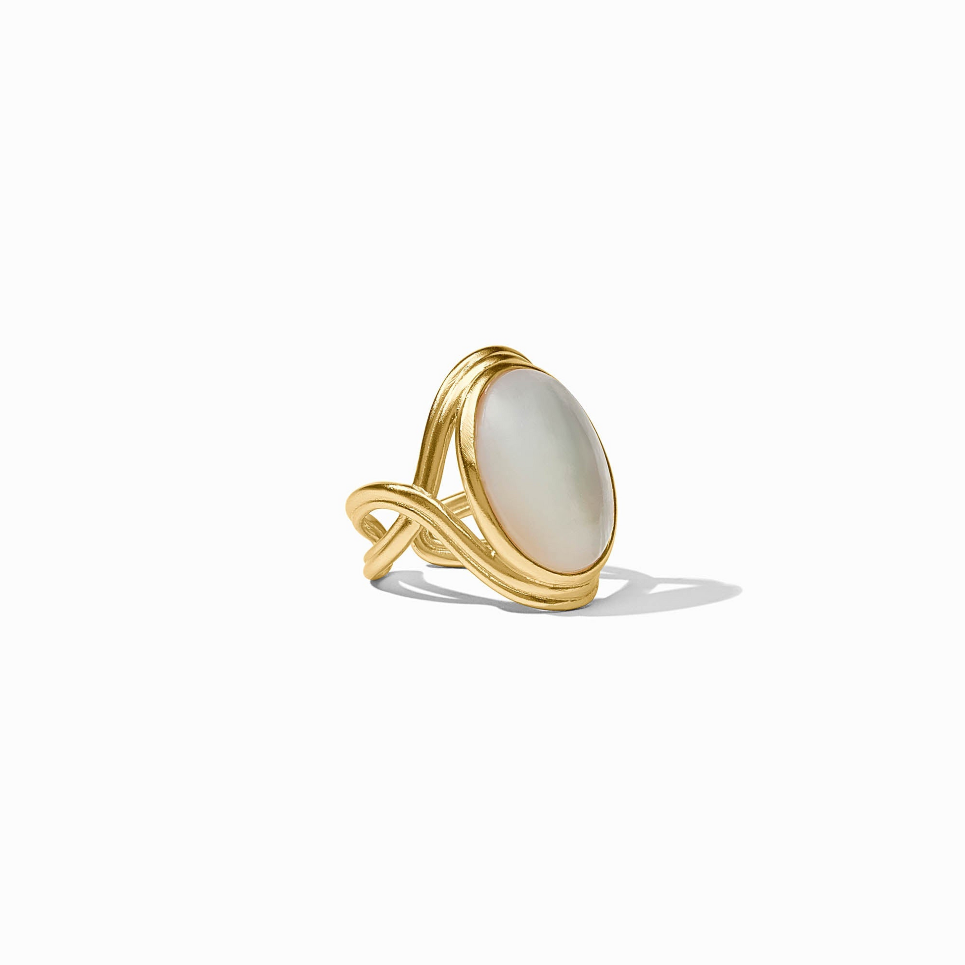 Gold Essex Statement Ring featuring a large oval mother of pearl stone and an adjustable band.