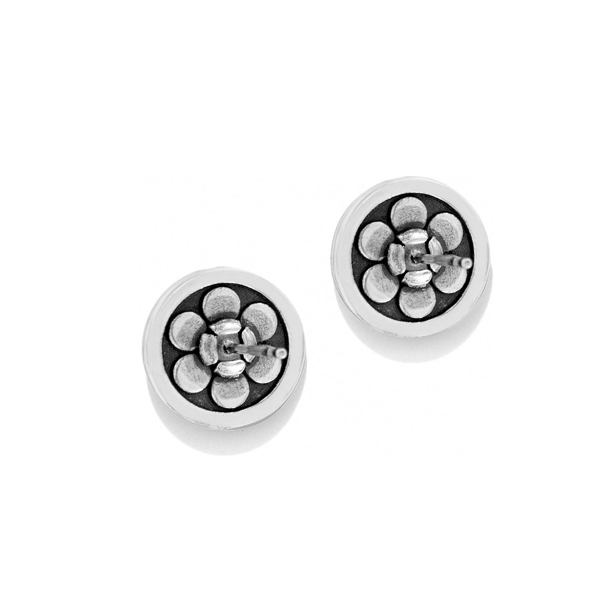 Silver Contempo post earrings featuring a circular design with a raised flower motif.