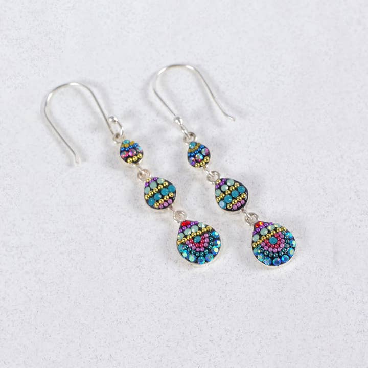 Sterling silver petite cascade earrings featuring dangling Austrian crystals in a teardrop silhouette.