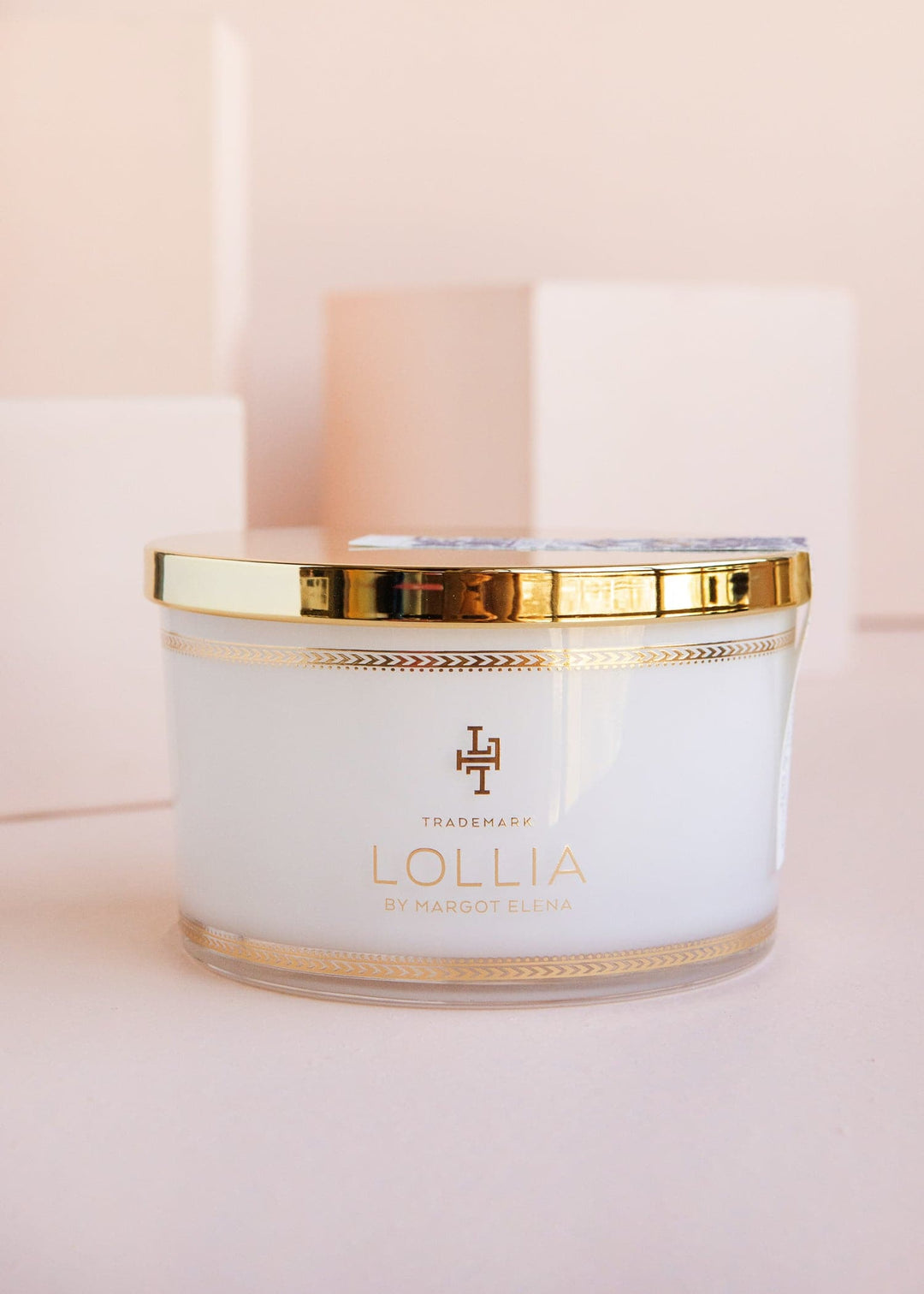 Round white bath salts jar with White Tea and honeysuckle fragrance.