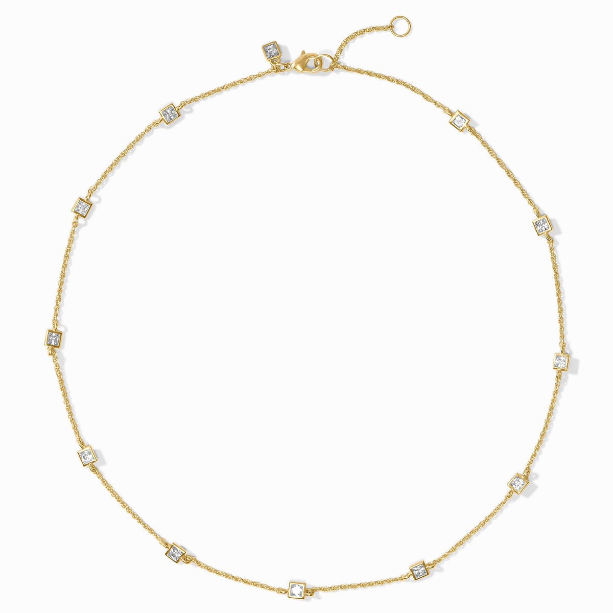 Delicate station necklace with cubic zirconia stones on a gold-plated chain.