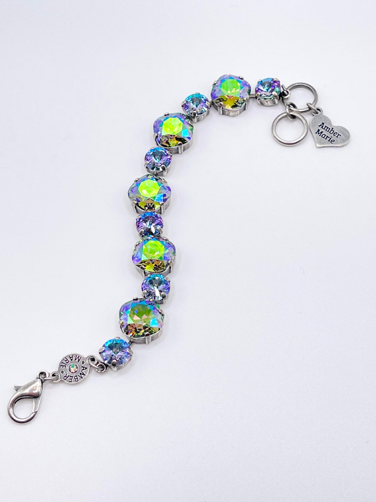 Premier Paris bracelet featuring iridescent round crystals and an Amber Marie heart charm.