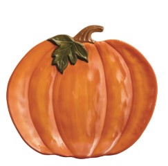 Orange ceramic pumpkin platter with a brown stem and green leaf detail.