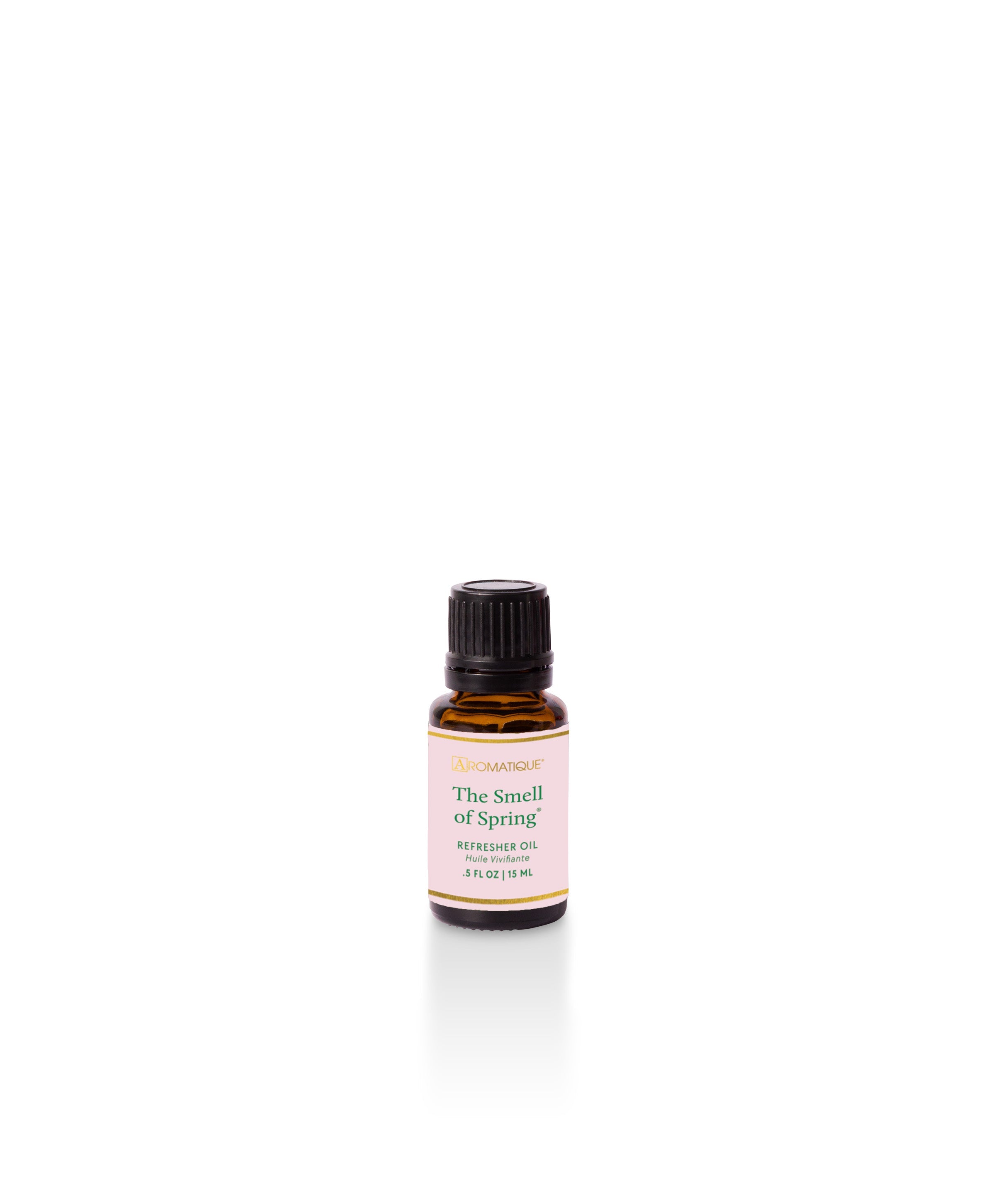 The Smell of Spring Refresher Oil in a clear bottle with green liquid.