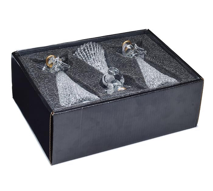 Set of three clear glass angel ornaments with gold halos in a black foam-lined gift box.