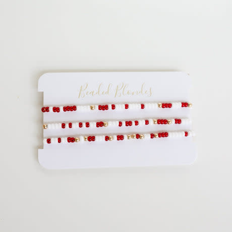 Handstrung bracelet with gold-filled beads, Czech glass accents, and durable elastic cord.