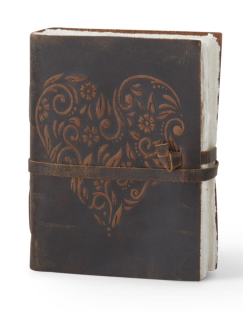 8 inch dark brown leather journal with an embossed floral heart design and a wrap-around strap.
