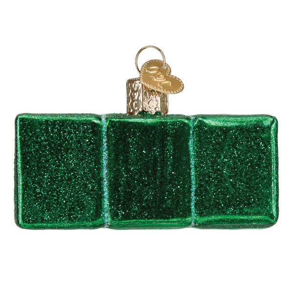 Green glittery Mahjong tile glass Christmas ornament with gold cap and heart charm.