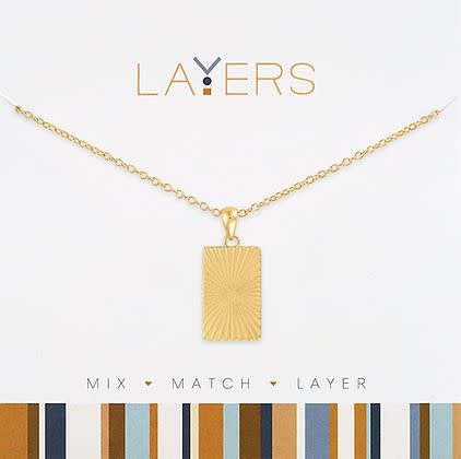 Gold textured rectangular tag pendant on a delicate chain from the Layers collection.