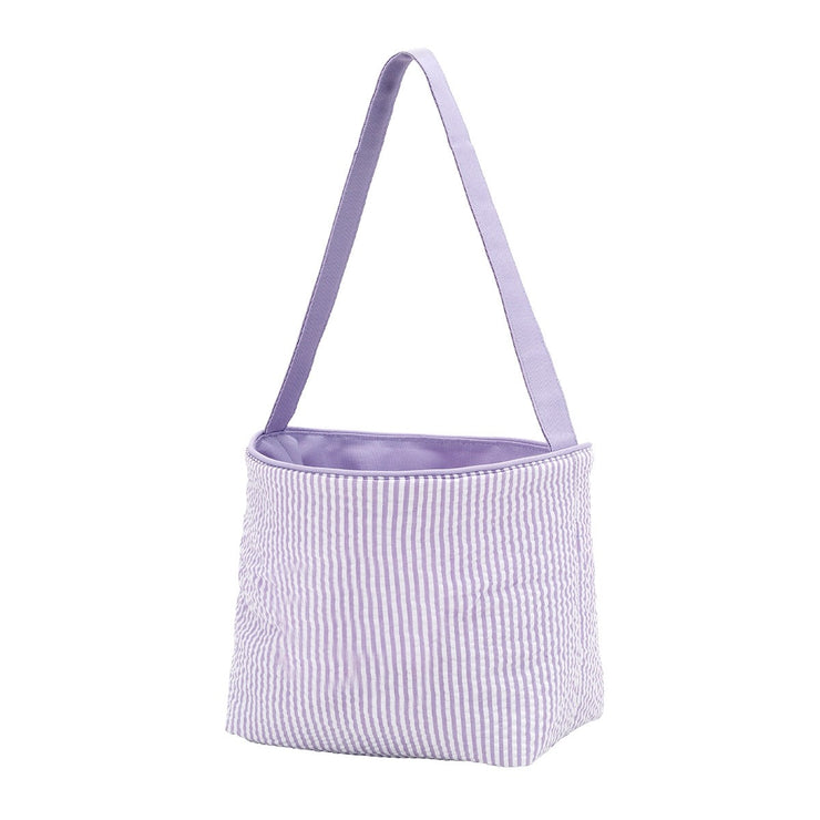 Seersucker bucket bag in light blue polyester with interior lining.
