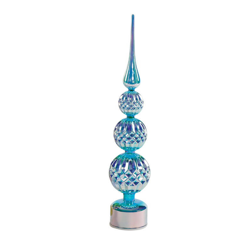 Tall iridescent blue glass revolving tree with three faceted spheres and a pointed spire top.
