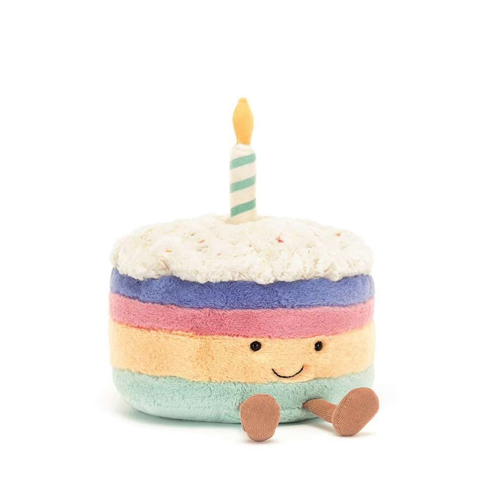Amuseables Rainbow Birthday Cake plush toy with polyester body, PE bean filling, and rainbow patterned hard eye.