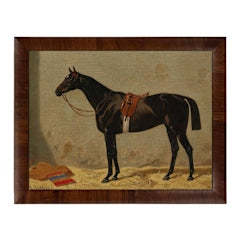 Vintage print on linen of a saddled dark horse in a stable, framed in a dark wood frame.