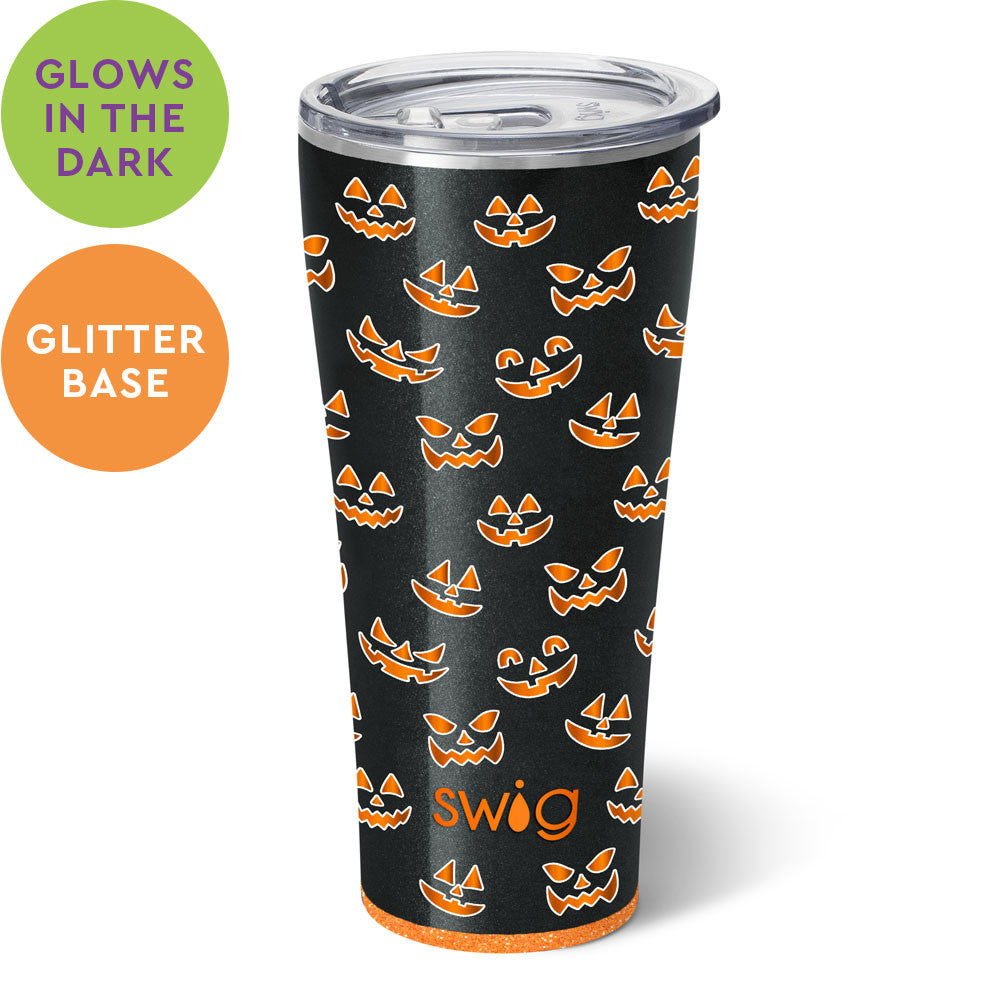 Black 32oz stainless steel tumbler with orange jack-o'-lantern pattern and glitter base.