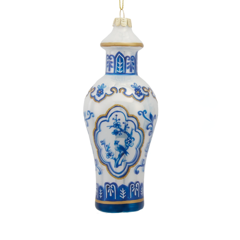 Glass blue and white vase ornament with a bird and floral design and gold accents.