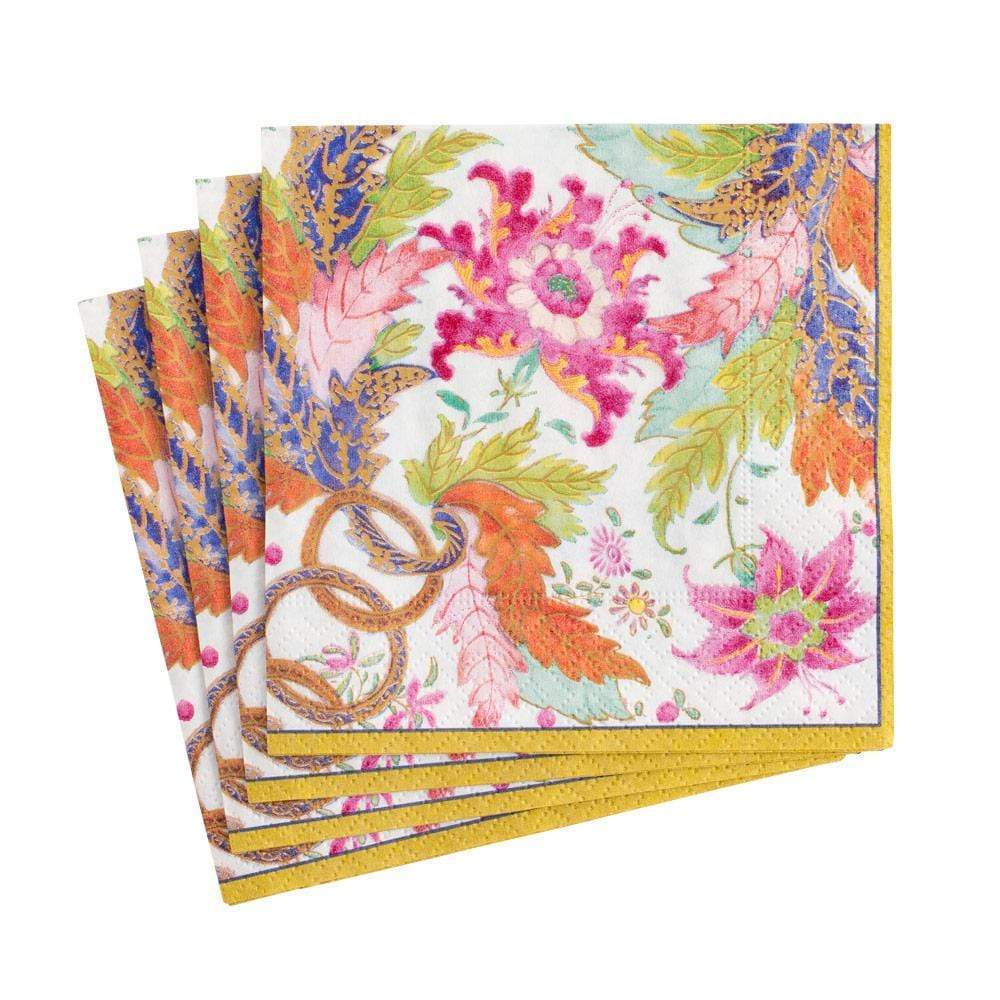 Pack of white triple-ply cocktail napkins with printed designs.