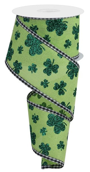 Green polyester gingham fabric with glitter shamrock patterns